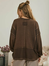 Load image into Gallery viewer, Split Neck Raw Edge Long Sleeve Ribbed Knit Top